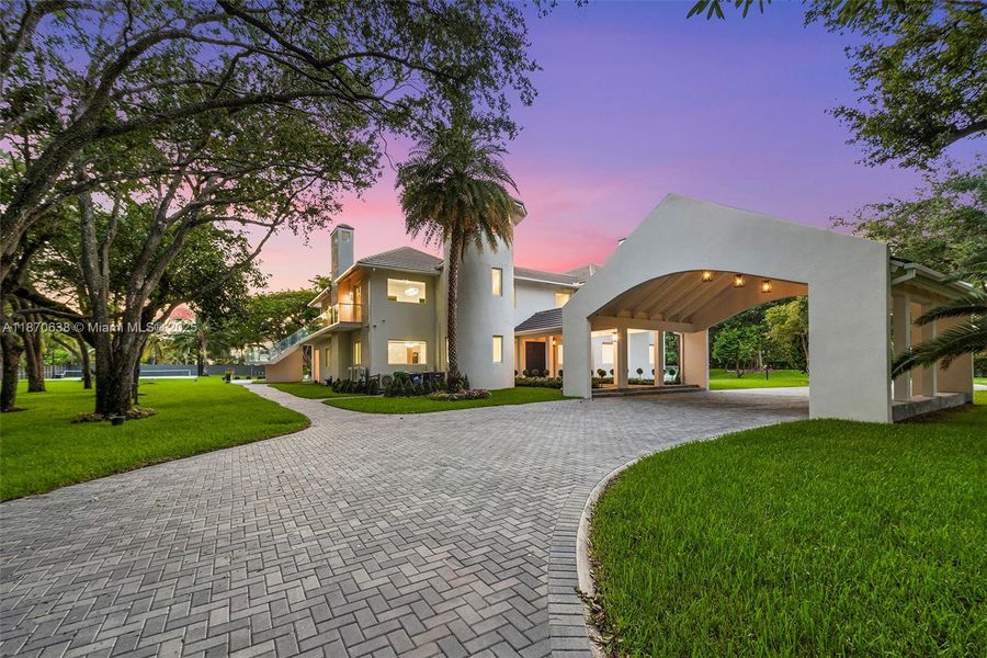 Front exterior of a new home in , Palmetto Bay, FL, highlighting curb appeal (Image 2).