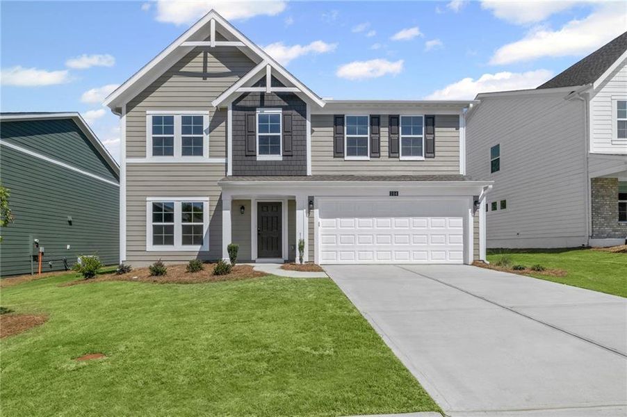 Front exterior of a new home in Sage Woods, Dallas, GA, highlighting curb appeal (Image 16). Front exterior of a new home in Sage Woods, Dallas, GA, highlighting curb appeal (Image 16).