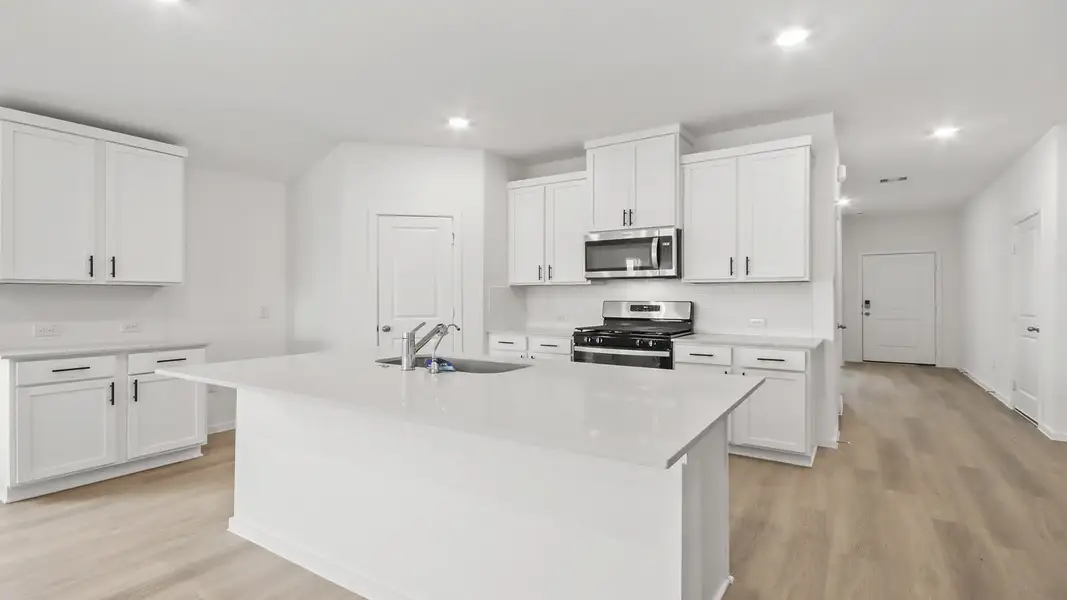 Furnished interior view inside a new home in Harrington Trails at The Canopies, Splendora (Image 3).