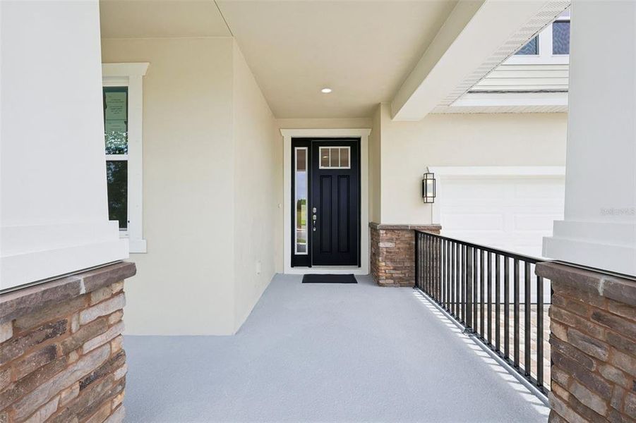 Exterior details and patio area of a home in Primrose at Longleaf, New Port Richey (Image 28).