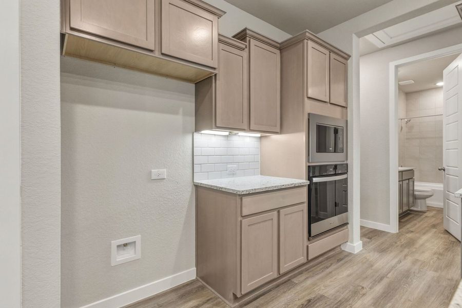 Furnished interior view inside a new home in Veranda Designer, San Antonio (Image 11).