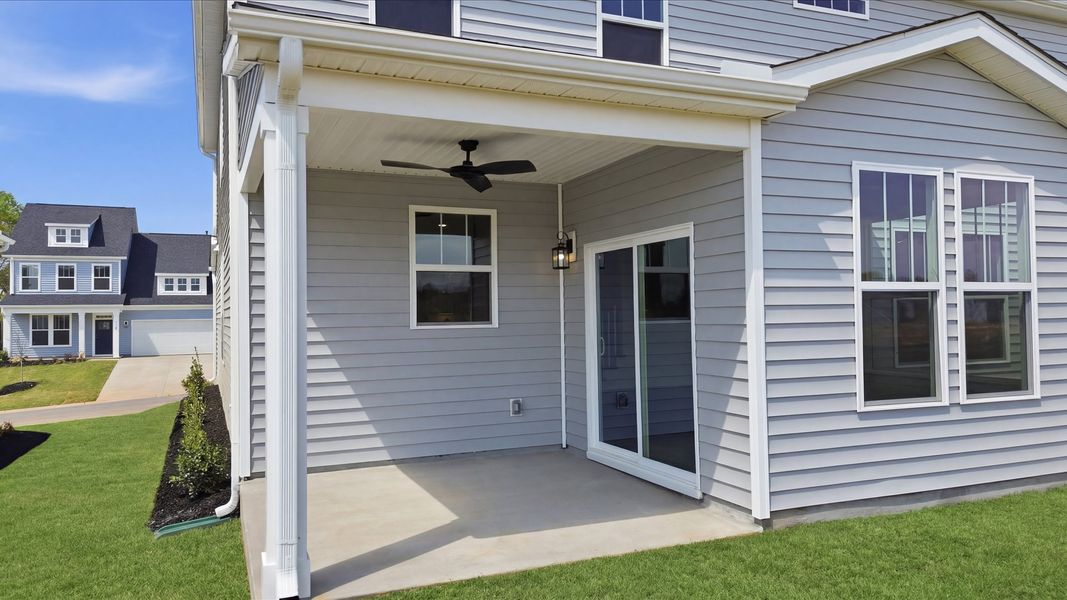 Exterior details and patio area of a home in Iris Meadows, Moore (Image 3).