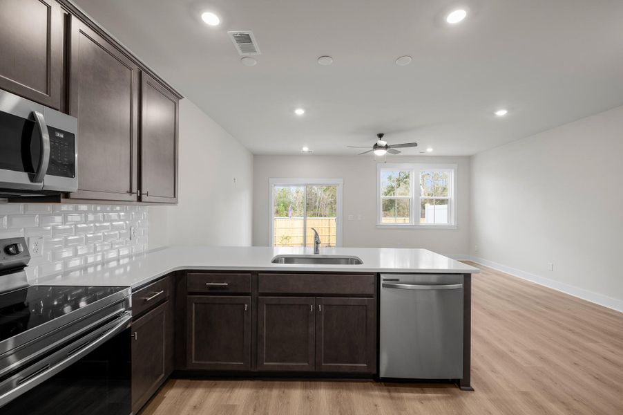 Photo is of a similar home