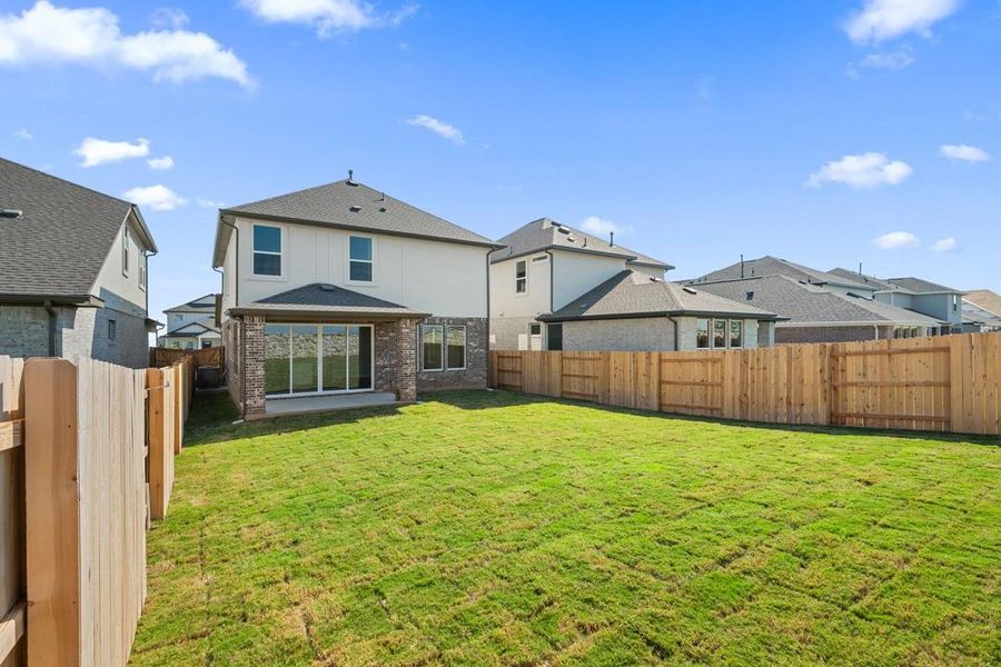 Exterior details and patio area of a home in Flora, Hutto (Image 21).
