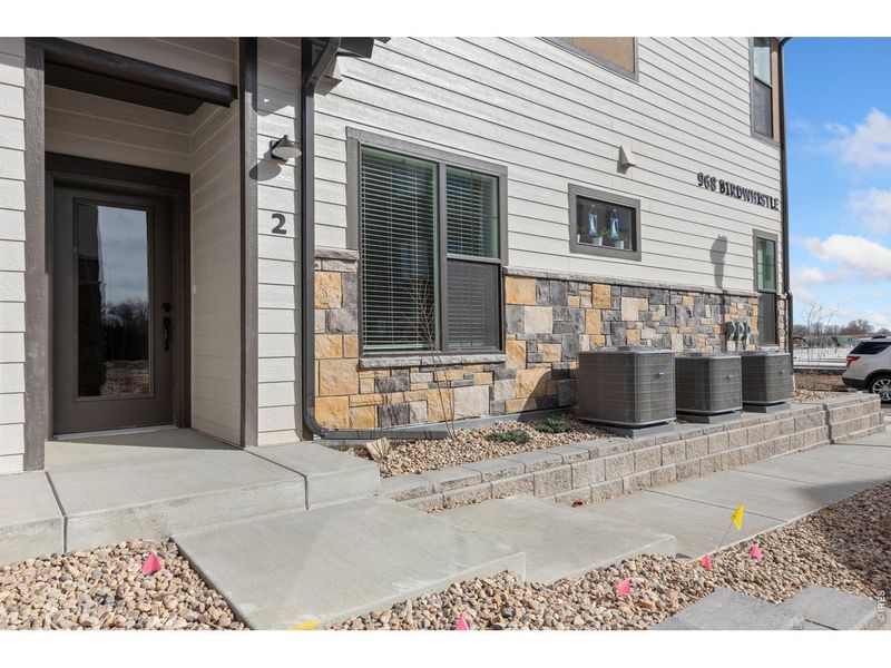 Exterior details and patio area of a home in Northfield at Old Town - Vista Collection, Fort Collins (Image 15).