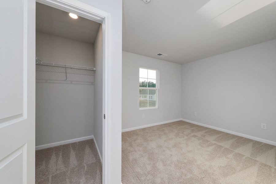 Spacious, unfurnished interior of a new home in Hainer Place, Conway (Image 43).
