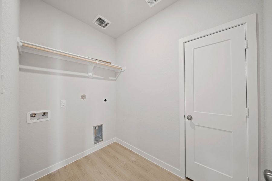A white room with a white door. A white room with a white door.