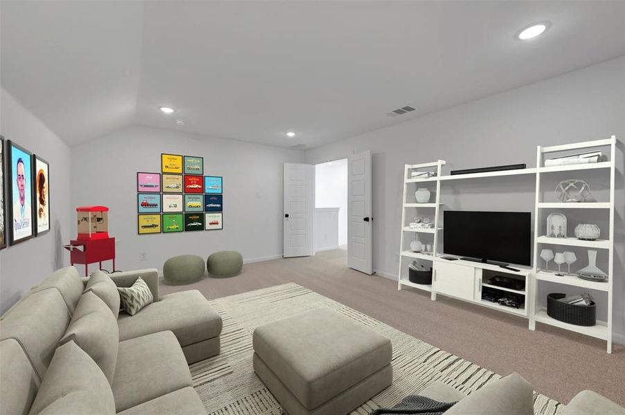 Spacious room featuring vaulted ceilings, recessed lighting, and carpeted flooring