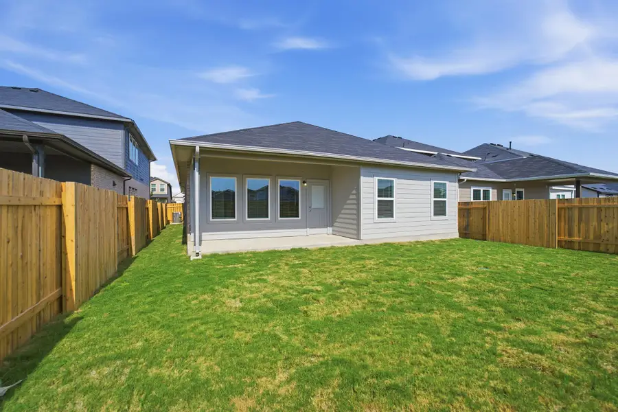Exterior details and patio area of a home in Sunfield, Buda (Image 2).