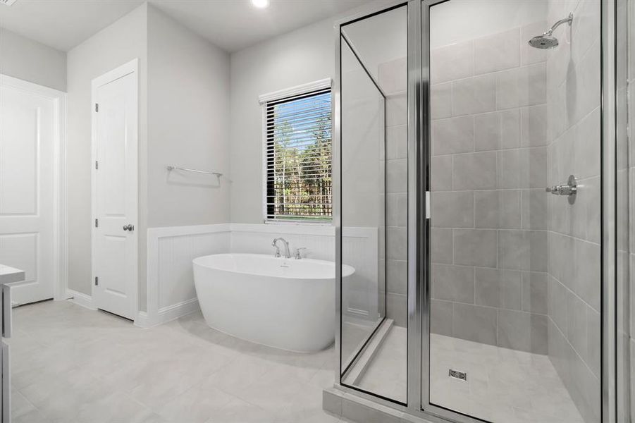 Primary bath with oversized soaking tub.