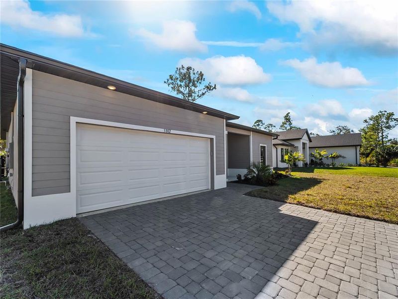 Exterior details and patio area of a home in , North Port (Image 32).