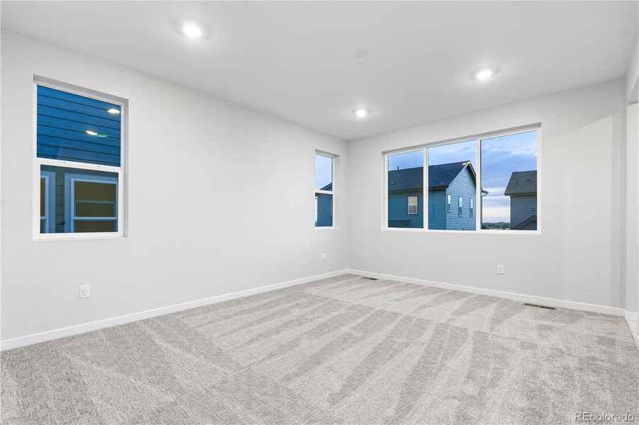 Spacious, unfurnished interior of a new home in Tribute at Lyric, Lone Tree (Image 21).