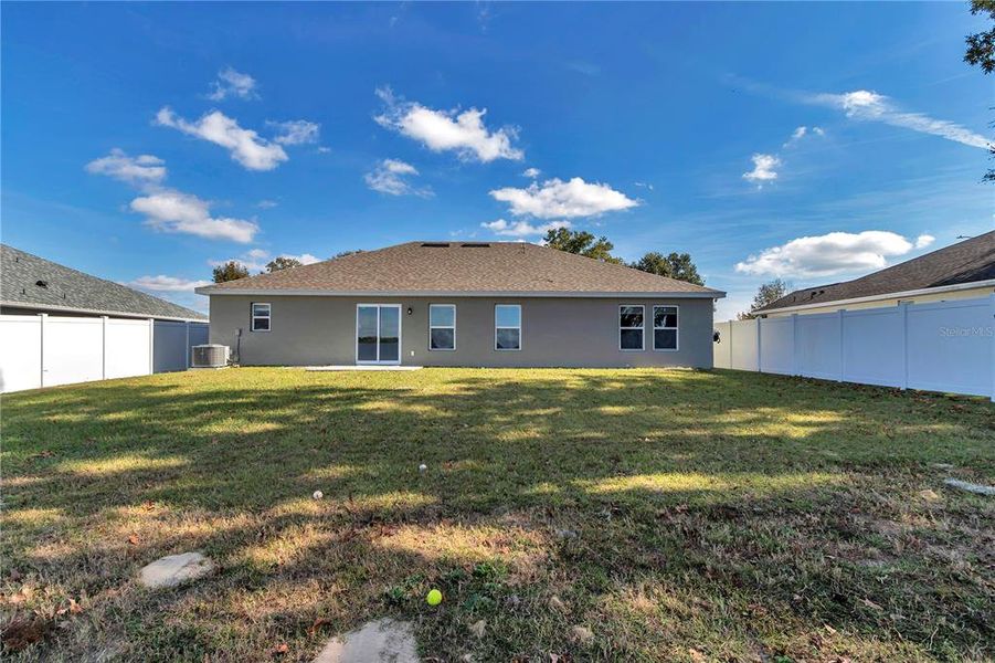 Exterior details and patio area of a home in Diamond Ridge, Belleview (Image 4).