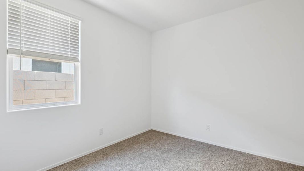 Representative unfurnished interior of a home built from the Puffin by D.R. Horton in Moonlight, Maricopa (Image 26).