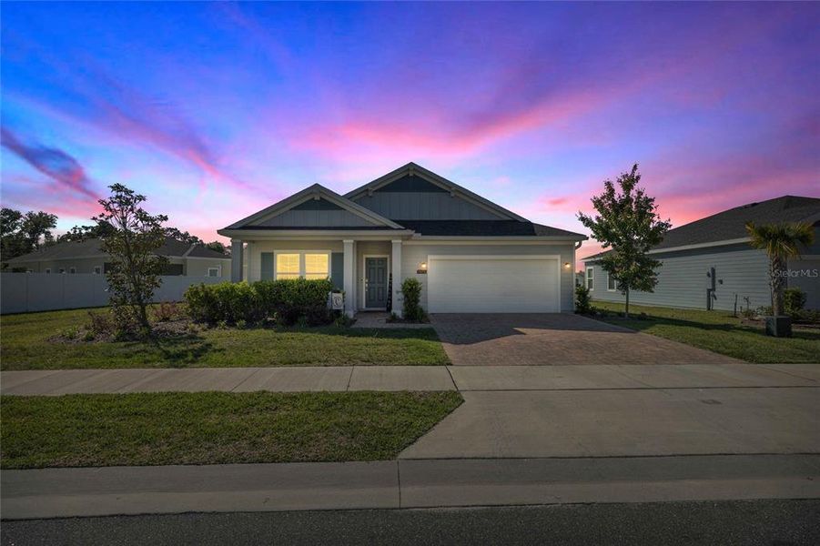 Front exterior of a new home in Heath Preserve, Ocala, FL, highlighting curb appeal (Image 25).