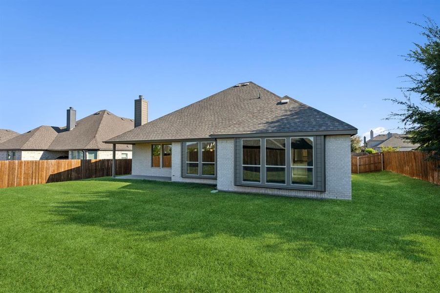 Another perspective of looking at this house with it's privacy fence and huge yard. Another perspective of looking at this house with it's privacy fence and huge yard.