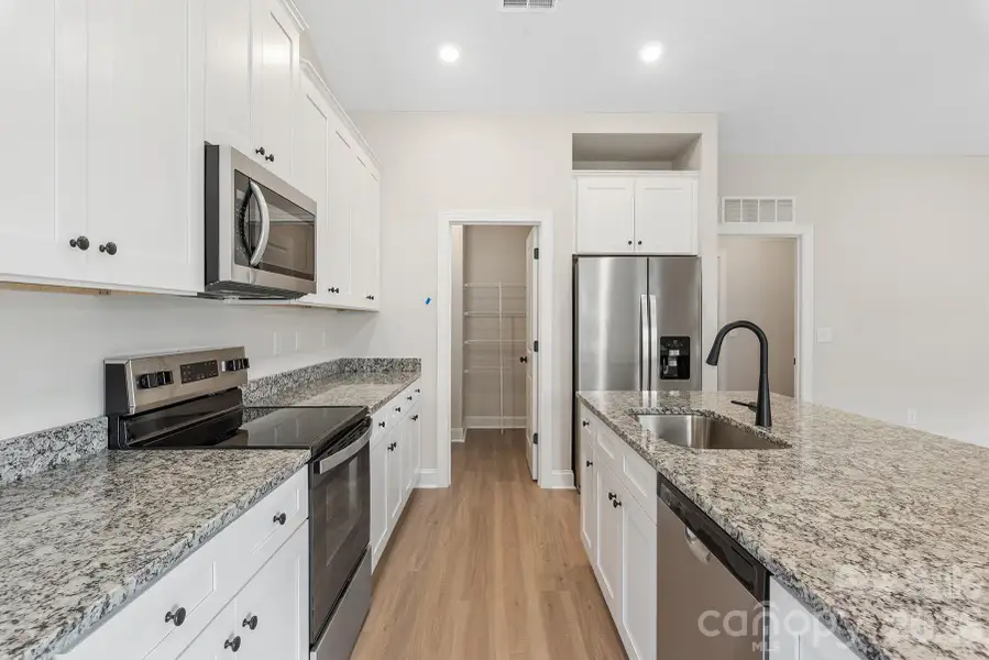 Furnished interior view inside a new home in Ascot Woods, Charlotte (Image 6).