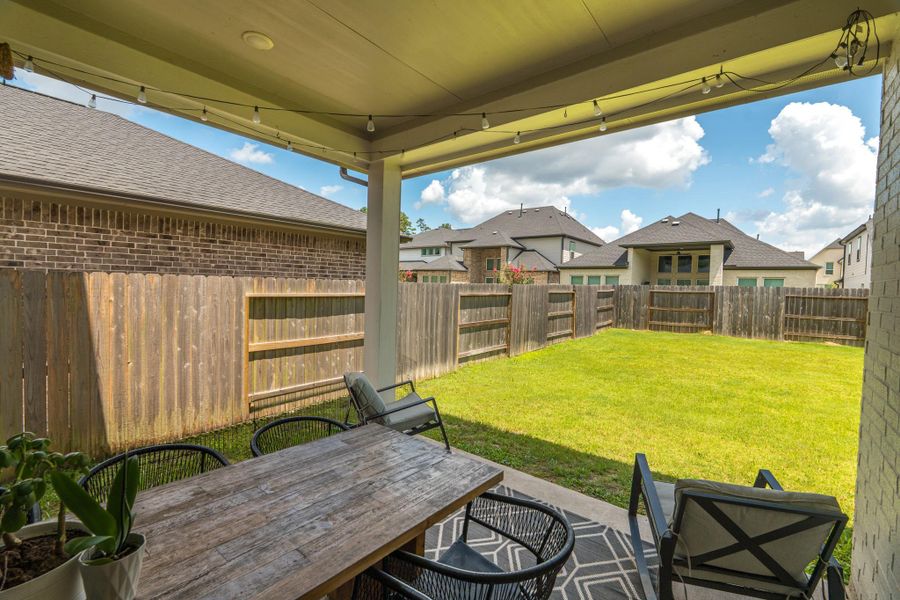 Exterior details and patio area of a home in Lakes at Creekside 50′, Tomball (Image 4). Exterior details and patio area of a home in Lakes at Creekside 50′, Tomball (Image 4).