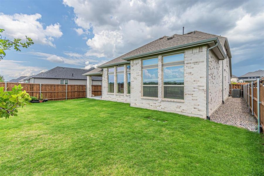 Exterior details and patio area of a home in , Aubrey (Image 29).