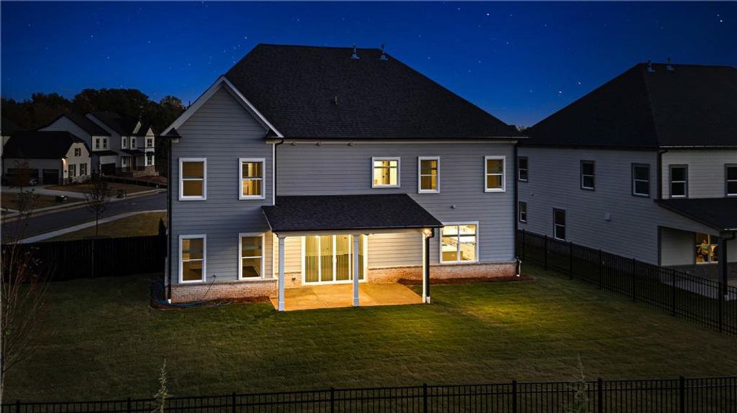 Front exterior of a new home in The Retreat at Caney Creek, Alpharetta, GA, highlighting curb appeal (Image 2).