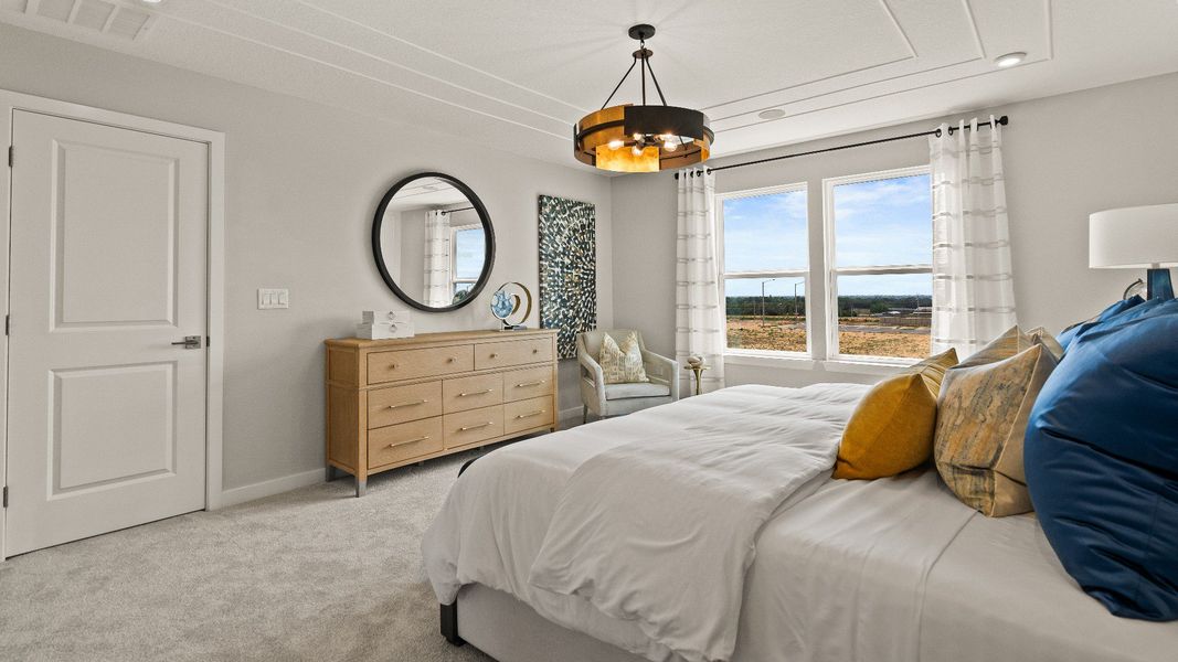 Primary Suite in the Model Highbourne by DRB Homes in Hamilton Bluff located in Haines City, FL. Primary Suite in the Model Highbourne by DRB Homes in Hamilton Bluff located in Haines City, FL.