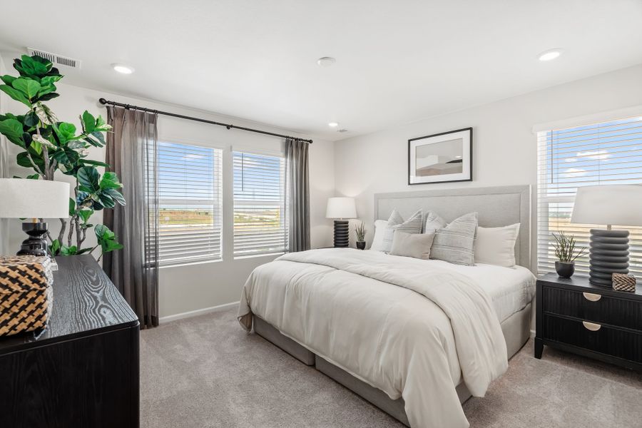 Representative furnished interior of a home built from the 2003 by Risewell Homes in Harvest Crossing, Aurora (Image 12).