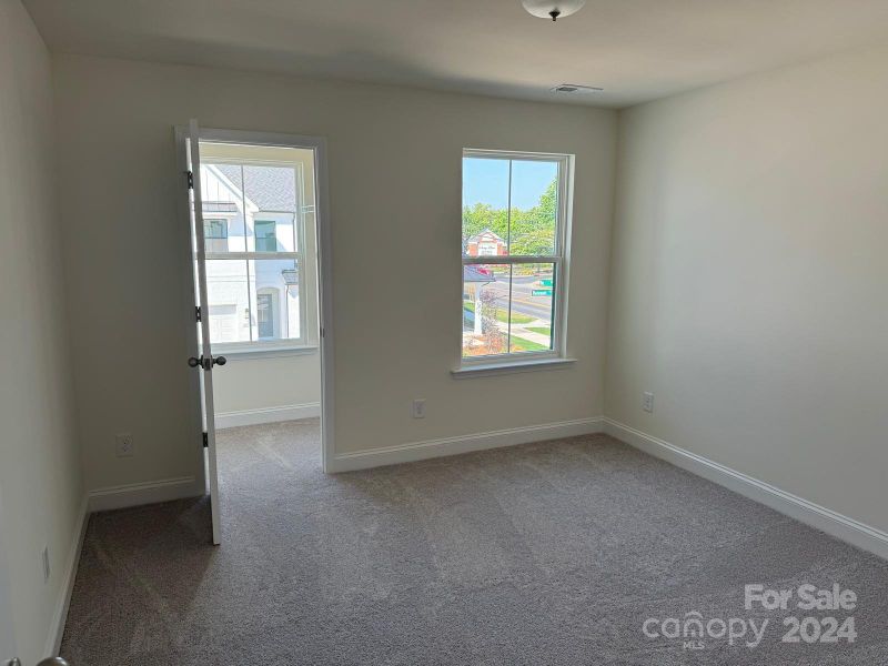 Bedroom 2 with view of closet