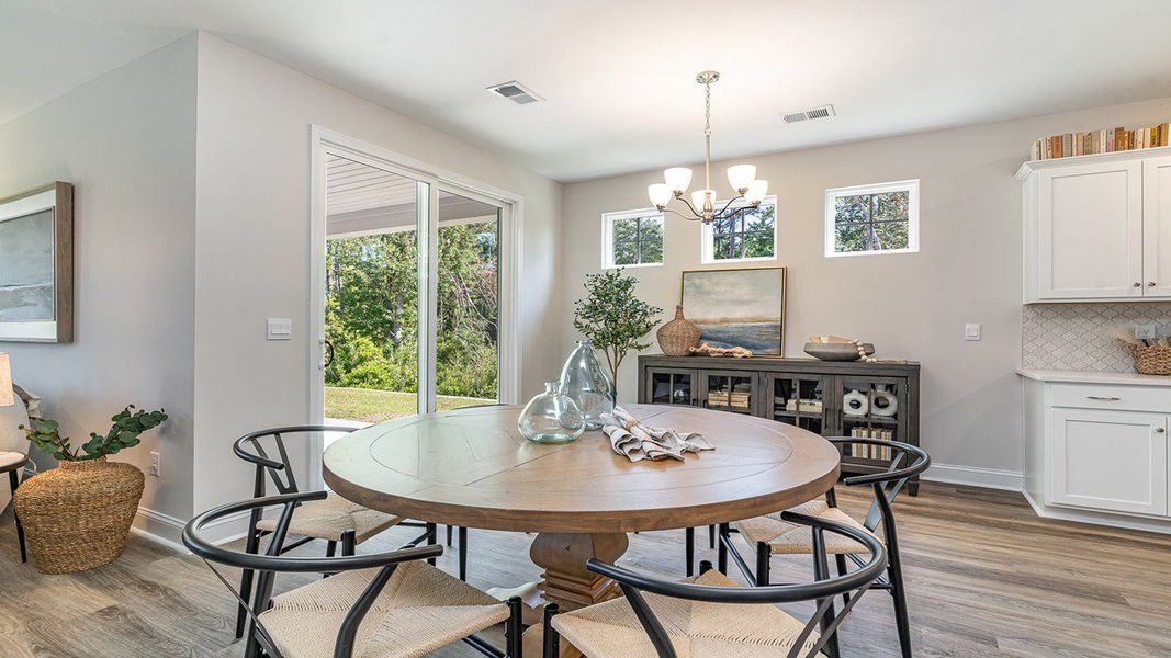 Furnished interior view inside a new home in The Bluffs at Mill Creek, Florence (Image 6).