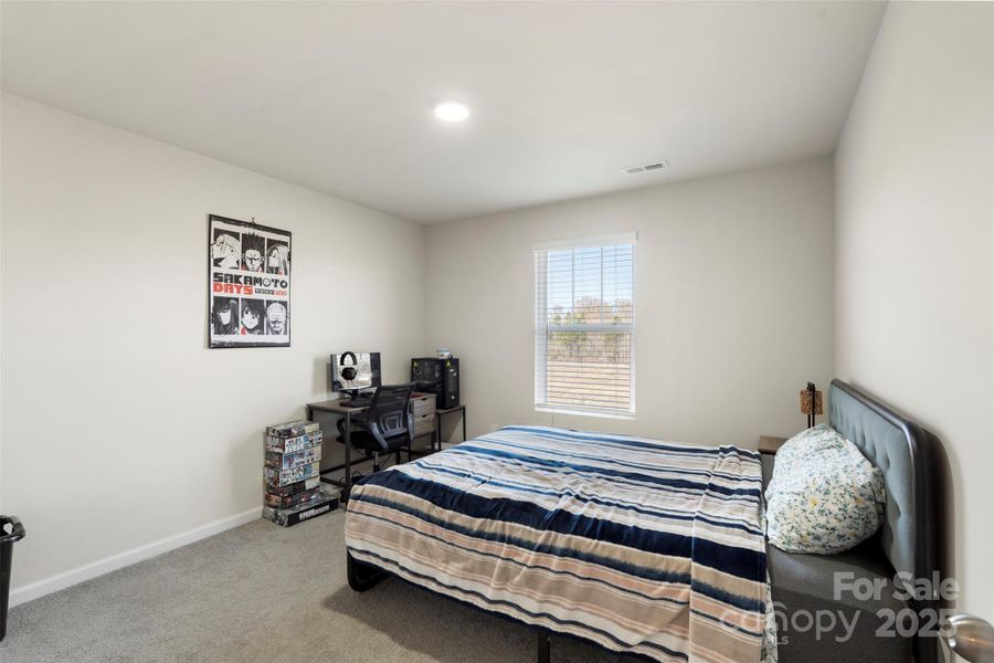 Furnished interior view inside a new home in Waxhaw Landing, Monroe (Image 14).