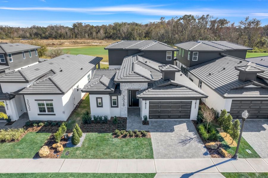 Representative exterior photo of a completed home built from the Courtyard 50 by ABD Development in Hampton Green at Providence, Davenport, FL (Image 25).
