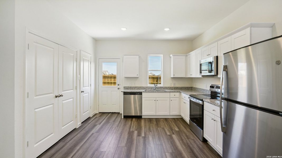 Furnished interior view inside a new home in Roosevelt Heights, San Antonio (Image 5).