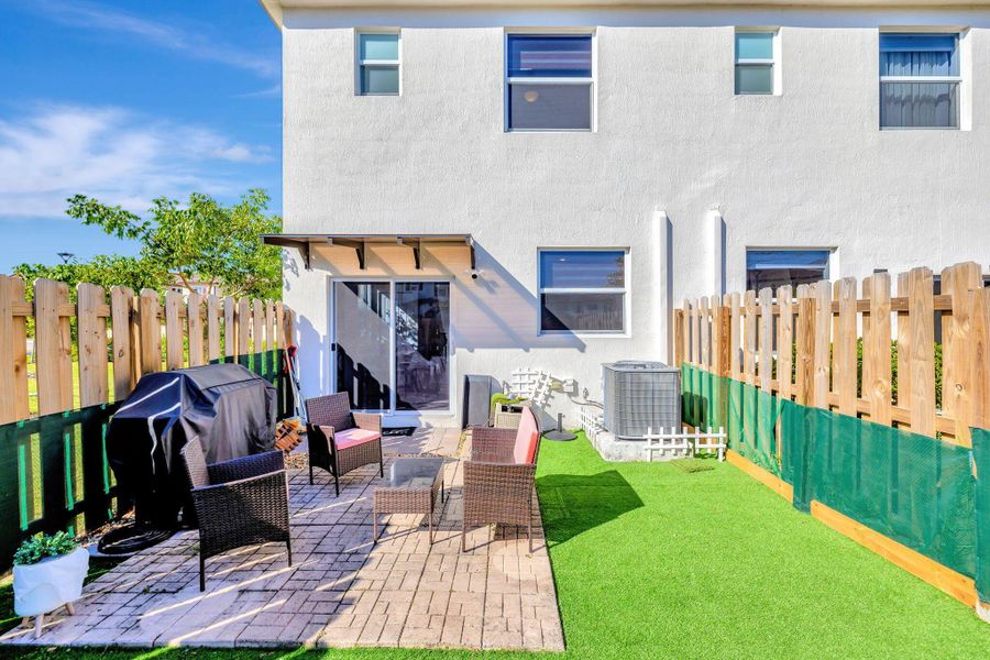 Exterior details and patio area of a home in , Miami (Image 1).