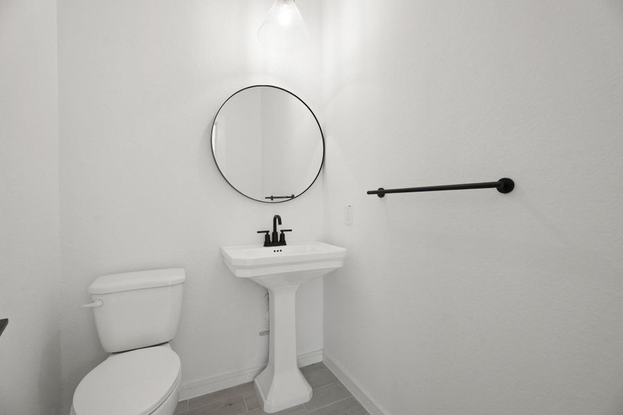 Half bath (*Photo not of actual home and used for illustration purposes only.) Half bath (*Photo not of actual home and used for illustration purposes only.)