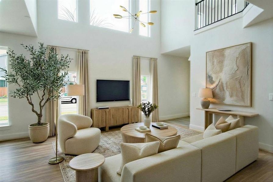 Photos have been virtually staged to show potential furnishings and décor. The property is sold unfurnished, and no furniture conveys.