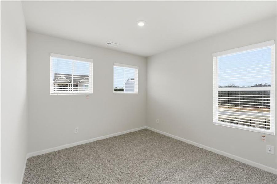Spacious, unfurnished interior of a new home in The Reserve at Chapel Hill Phase II, Douglasville (Image 16).