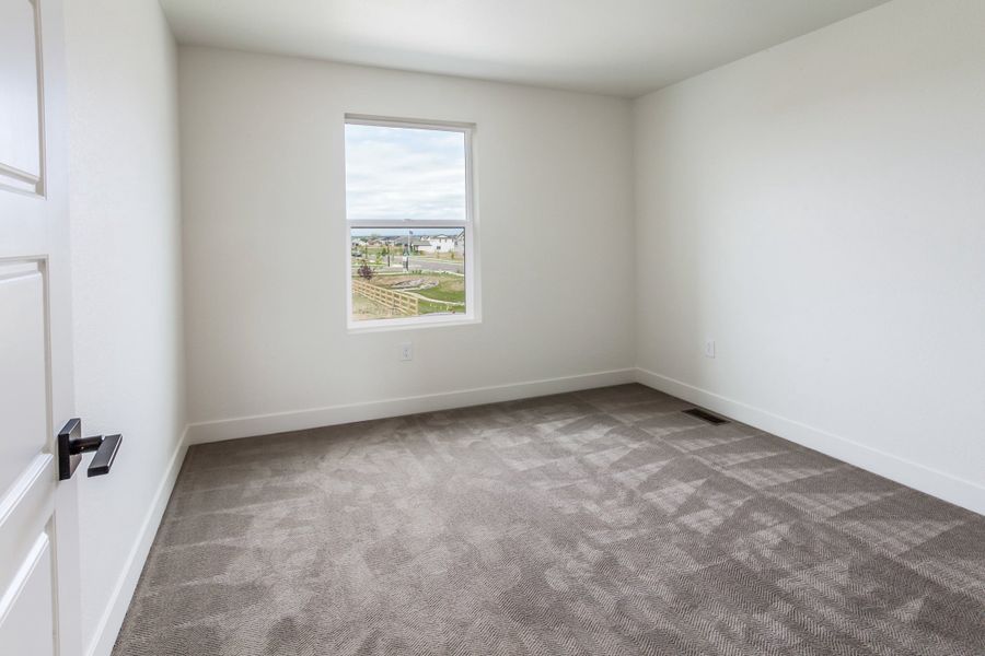Spacious, unfurnished interior of a new home in Prairie Song, Windsor (Image 24).