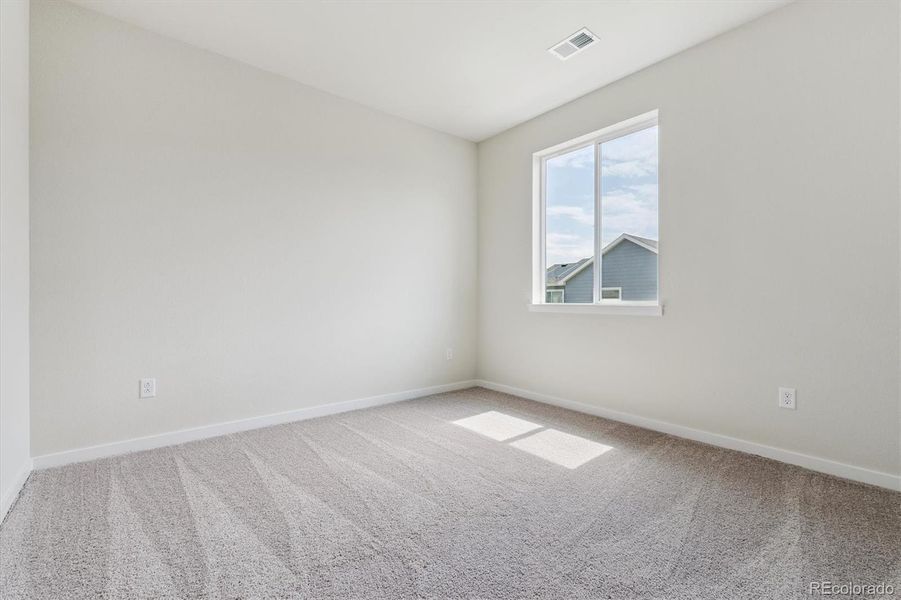 Spacious, unfurnished interior of a new home in Floret Collection at Parkdale Commons, Lafayette (Image 17).