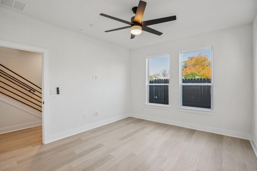 Spacious, unfurnished interior of a new home in Koenig Townhomes, Austin (Image 18).