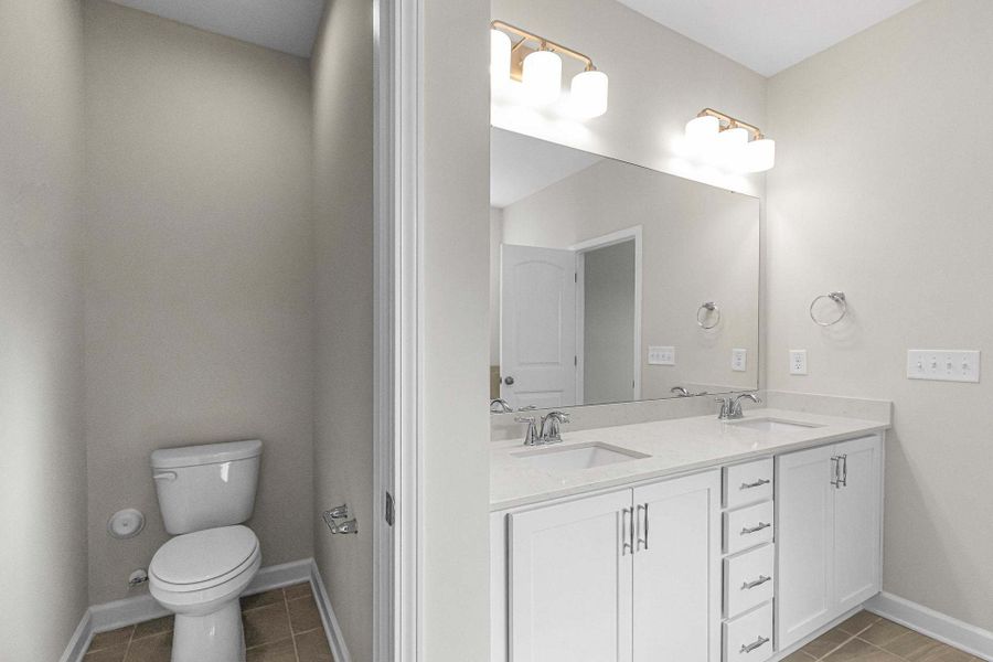 Representative furnished interior of a home built from the Clayton by Caviness & Cates Communities in Bartlett Manor, Youngsville (Image 184).