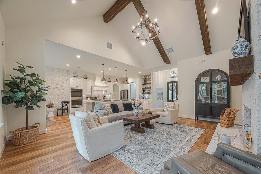 Vaulted ceiling, beams and exquisite chandelier