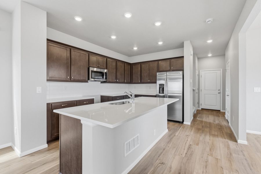 Furnished interior view inside a new home in Windler, Aurora (Image 4).