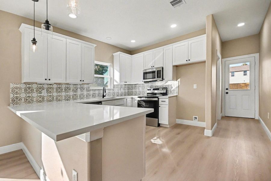 Furnished interior view inside a new home in , La Marque (Image 6).