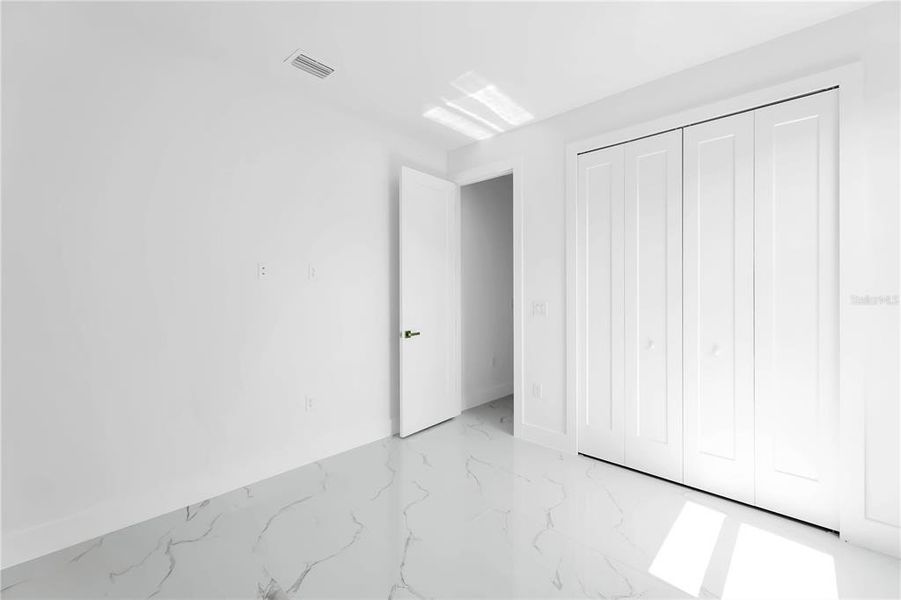 Spacious, unfurnished interior of a new home in , Port Charlotte (Image 12).