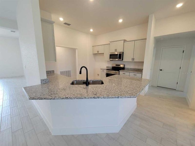 Furnished interior view inside a new home in , Ocala (Image 4).