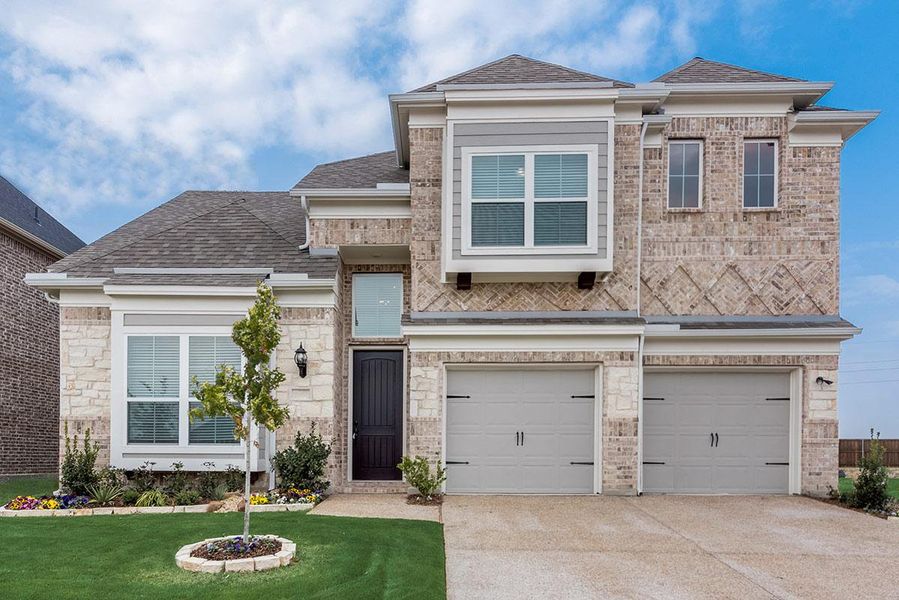 Representative exterior photo of a completed home built from the Grand Martinique by Grand Homes in Grand Oaks, Celina, TX (Image 17). Representative exterior photo of a completed home built from the Grand Martinique by Grand Homes in Grand Oaks, Celina, TX (Image 17).