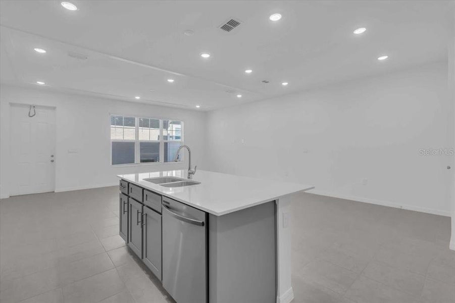 Furnished interior view inside a new home in The Residences at Emerson Park, Apopka (Image 4). Furnished interior view inside a new home in The Residences at Emerson Park, Apopka (Image 4).