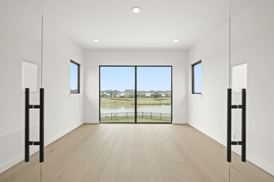 Spacious, unfurnished interior of a new home in Bridgeland, Cypress (Image 43).