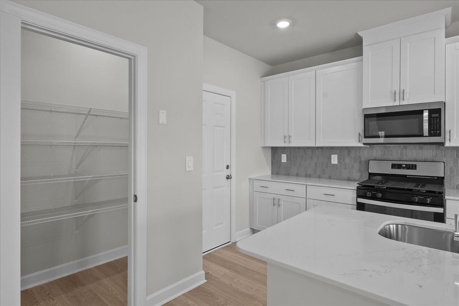 Furnished interior view inside a new home in Village at White Pine, Pendleton (Image 6). Furnished interior view inside a new home in Village at White Pine, Pendleton (Image 6).