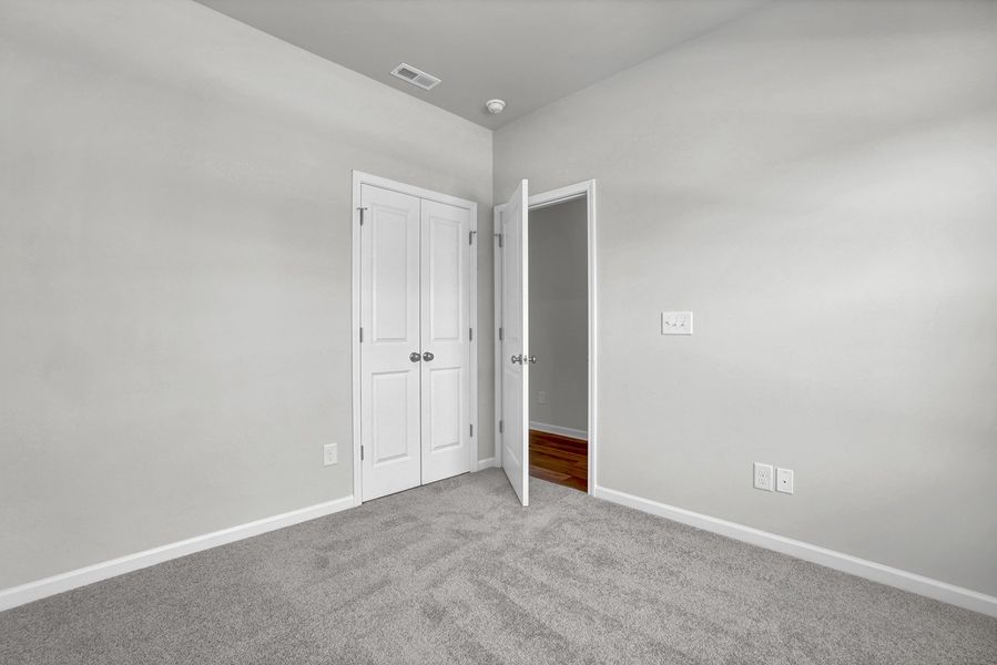 Spacious, unfurnished interior of a new home in River Tide Farms, Bolivia (Image 23).
