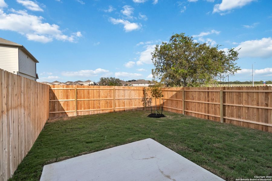 Exterior details and patio area of a home in Abbott Run, San Antonio (Image 20).